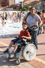 child with cerebral palsy i enjoying an inclusive outdoor foam party
