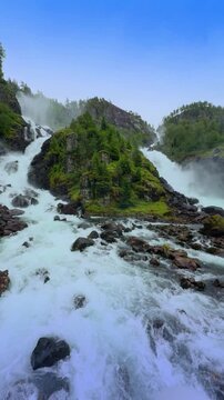 Latefossen waterfall stone bridge in Hardanger Norway