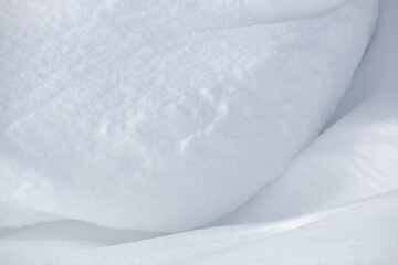 Close up of textured white snowdrift abstract background