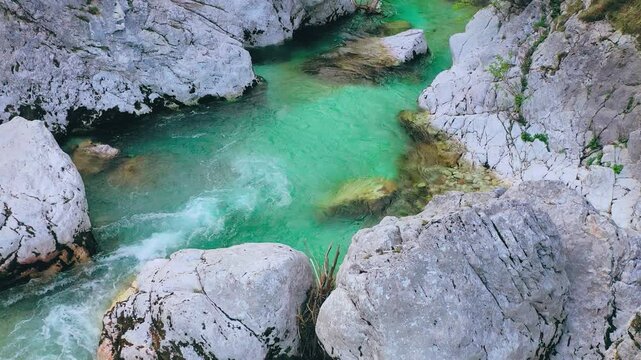 Mountain river flowing between rocks aerial view