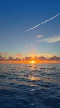 Costa Blanca sunrise over calm Mediterranean sea and coastal horizon