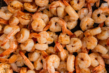 Fried shrimp in close-up in a frying pan
