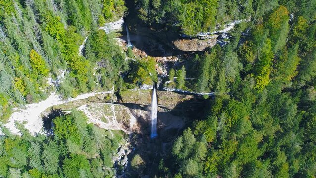 Pericnik Waterfall in alpine forest aerial view