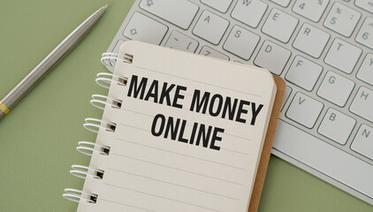 MAKE MONEY ONLINE text on notepad on keyboard with chart on green background, concept closeup. Business and finance concept