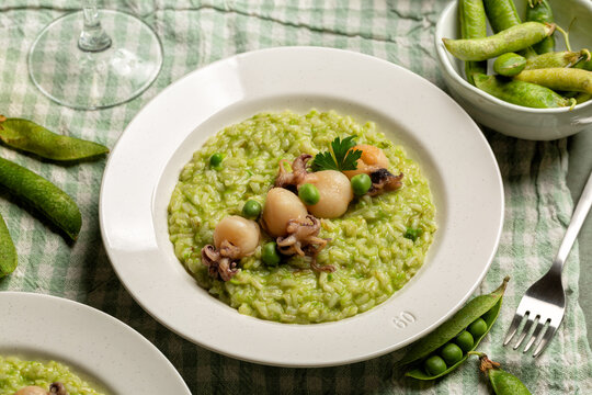 Risotto; pea; cuttlefish; green; rice; italian; seafood; seppia; meal; dish; food; lunch; above; homemade; healthy; plate