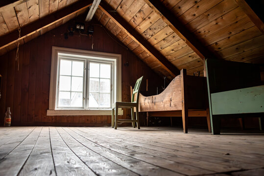 Bedroom in the attic of an old traditional Norwegian wooden house