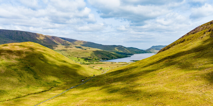 Beautiful aerial view of Connemara region in Ireland. Scenic Irish countryside landscape with mountains on the horizon, County Galway, Ireland.