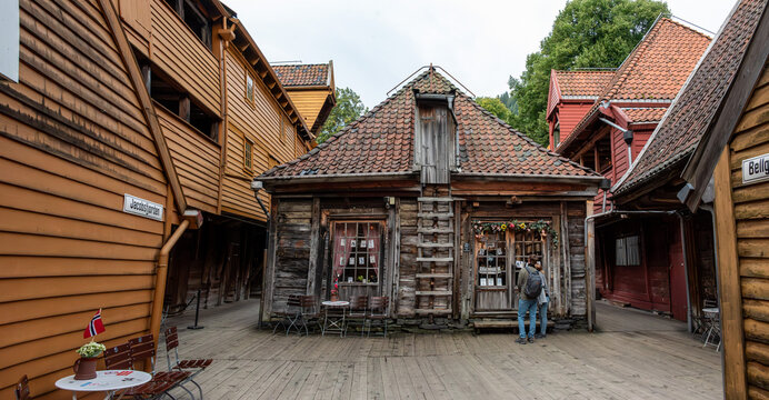 Narrow alley with old trading houses in the former commercial district Bryggen in Bergen