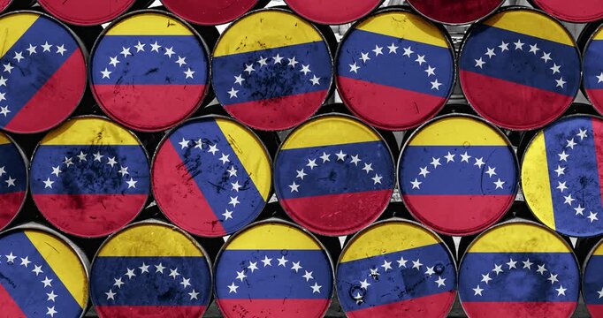 a panning of a lot of oil rusty barrels with the venezuela flag