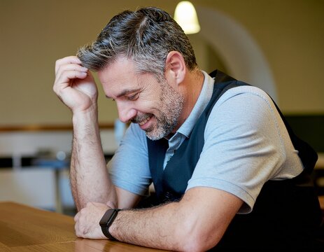 a man was sitting at the restaurant table