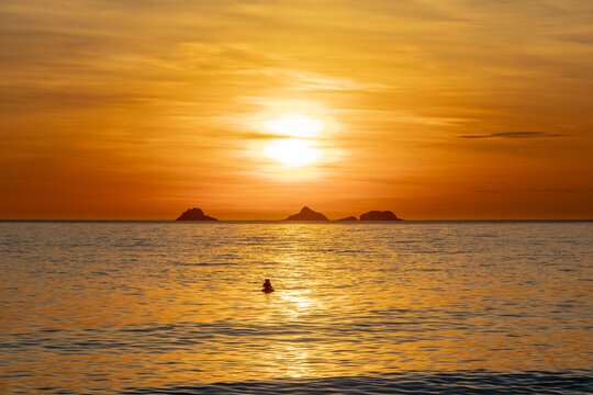 Sunset at Arpoador Beach in Rio de Janeiro.