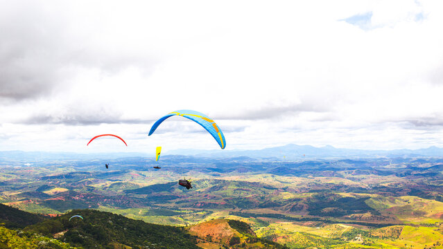 Parapent flying over the sky. World Capital of Free Flight. Governor Valadares. Championship of parapent.