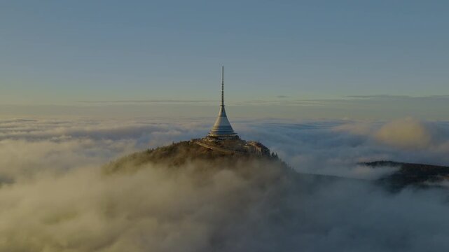 Beautiful Sunset over Famous Mountain Hotel Jested , Aerial Shot Above Clouds