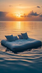Double bed floating in thepool, comfortable mattressand pillows, tranquility ad beauty of sunset, summervacation concept.
