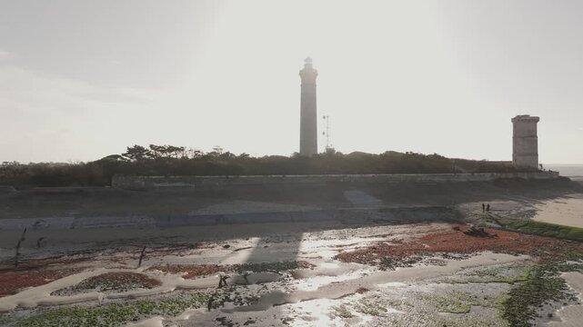 Lighthouse and birds flying on the beach, drone video, Ile de Re France 4K