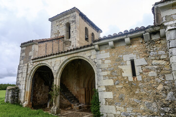 Fototapeta premium Romanesque bell tower of San Juan Bautista Church in Loma de Castrejon
