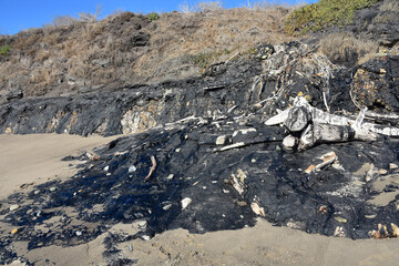Sand Beach with Tar Oozing Out to form Rocks