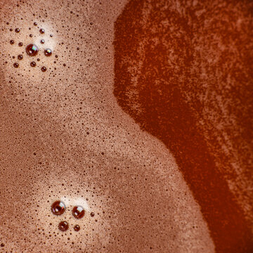 Hot chocolate foam macro texture background