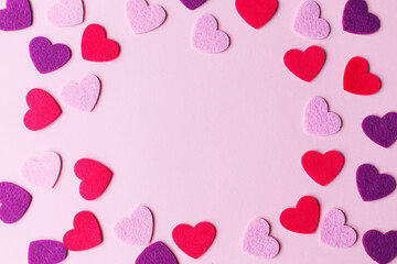 Happy Valentine's day! Stylish pink and red hearts flat lay on pink paper background. Modern cute...