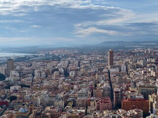 Fototapeta premium Urban mountain view, Scenic overlook revealing sprawling cityscape and rugged mountain terrain