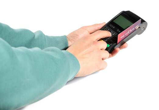 Man using payment terminal on white background, closeup