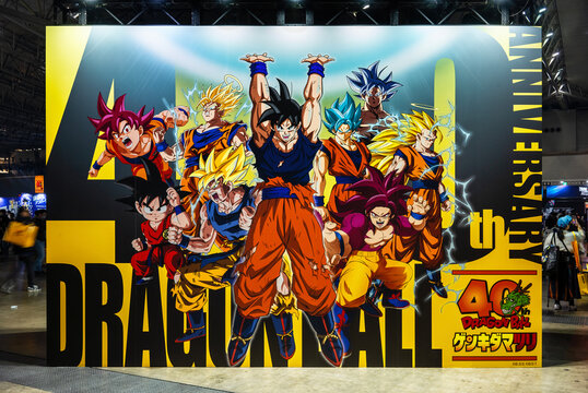 chiba, makuhari - jan 25 2026: A giant Japanese mural shows diverse Goku forms with the central figure in a Genki Dama pose at the free Dragon Ball Genkidamatsuri event for series 40th anniversary.