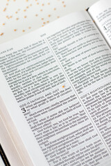 Obraz premium God is faithful and just text in open holy bible book with mustard seeds on white background. Christian biblical concept of righteousness and trust in Jesus Christ.