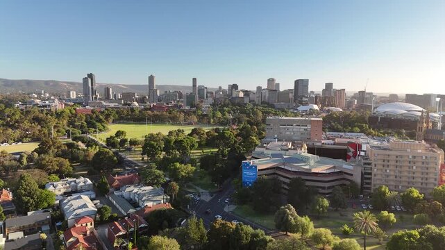 North Adelaide, South Australia: 4K Aerial Drone Footage of City Skylines, CBD, Towers, Parklands, Suburban Houses, Residential Estates, City Landscape at Sunset