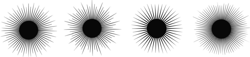 A row of four black circular objects with radial lines and shading, viewed from directly above
