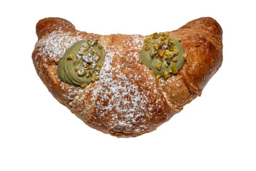 Croissant filled with pistachio cream isolated