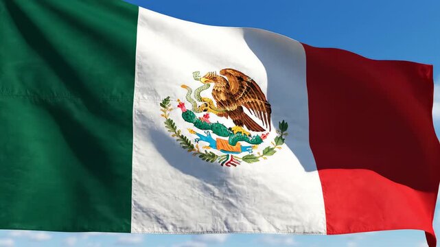 Mexican flag waving in sky