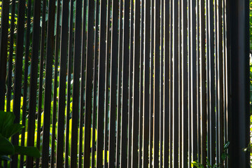 Seamless pattern of modern wall paneling with vertical wooden slats