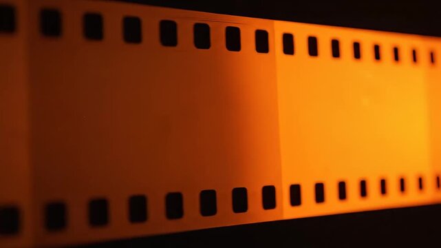 Film strip with orange glow