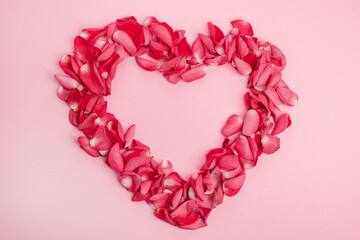 Beautiful and festive celebration background with roses, present and card for valentines day celebration or birthday wishes romantic in red and pink