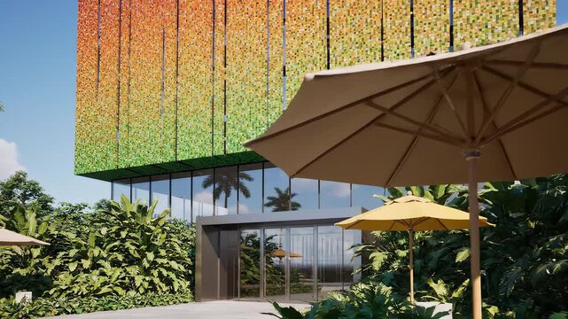 Modern building with colorful facade and tropical garden
