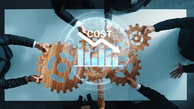 A diverse team of business professionals engages in a collaborative meeting to strategize on cost reduction using visual graphs and gear symbols to represent financial analysis. Raster