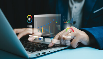Performance analytics concept. Hands using laptop with KPI dashboard and growth charts, data driven...