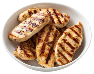 Grilled chicken breast pieces in a white bowl, golden brown with grill marks