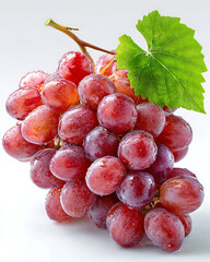 Fresh bunch of red grapes with green leaf isolated on white background