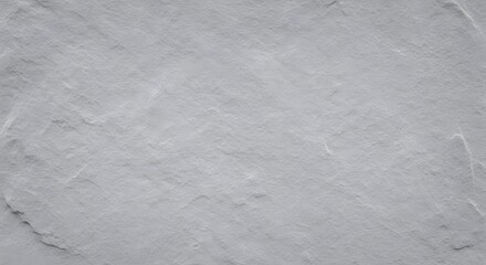 High resolution natural grey slate stone texture with a rough uneven surface, ideal for architectural backgrounds, rustic construction themes, or industrial design projects.