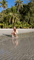 Obraz premium Relaxing moments at Ao Jark Beach in Koh Kood, Thailand under the sun
