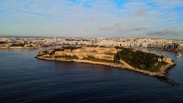 Drone shot of Manoel Island with Fort Manoel and historic Lazzaretto buildings in Malta.