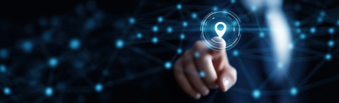 Hand pressing an illuminated map pin icon on a glowing digital network, symbolizing connection, navigation, and global positioning