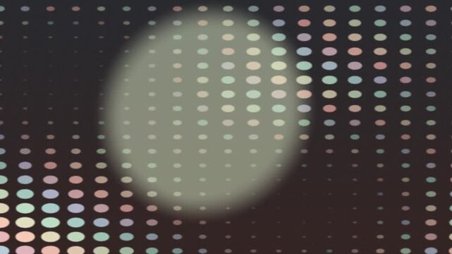 Abstract digital pattern with a grid of colorful dots and a central blurred oval shape.