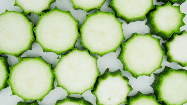 fresh luffa acutangula isolated on white