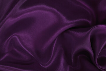 Obraz premium Purple fabric cloth texture for background and design art work, beautiful crumpled pattern of silk or linen.