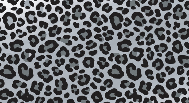 Close-up of a black and white leopard or cheetah print pattern.