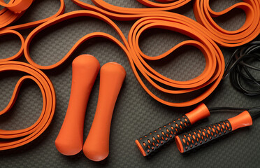 Obraz premium Colorful fitness background with textured accessories