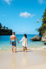 Couple enjoying a romantic moment at Playa Lagun beach in Curacaos stunning Caribbean paradise