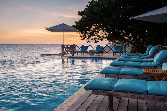 Relaxing sunset view by the infinity pool in Pietermaai, Curacao